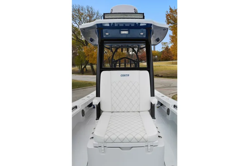 Slide: The Image of 2023 Costa Custom Boats 264 HC interior with white quilted seating and sleek design. - 14