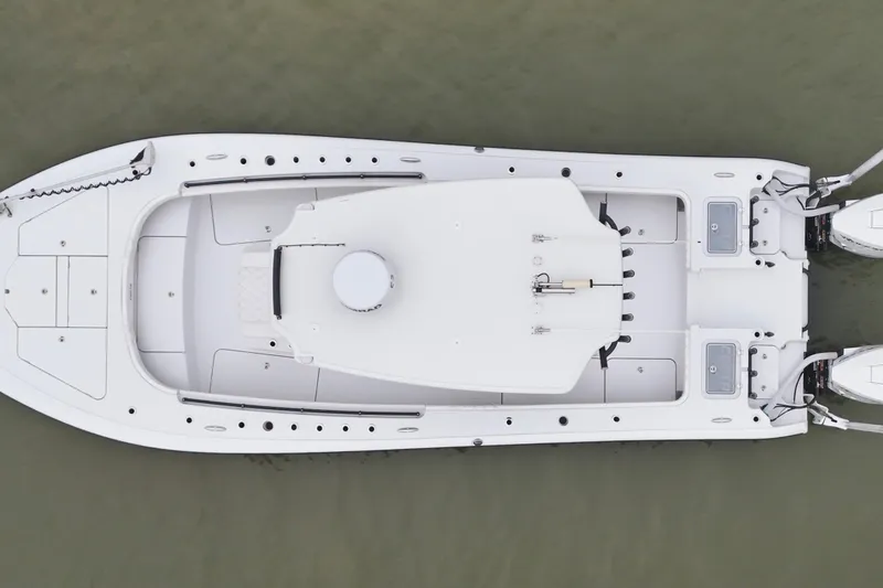 Slide: The Image of Overhead view of 2023 Costa Custom Boats 264 HC on water. - 5