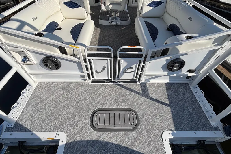 Slide: The Image of Interior of 2026 JC Sporttoon 26TT pontoon boat with plush seating and modern design. - 18