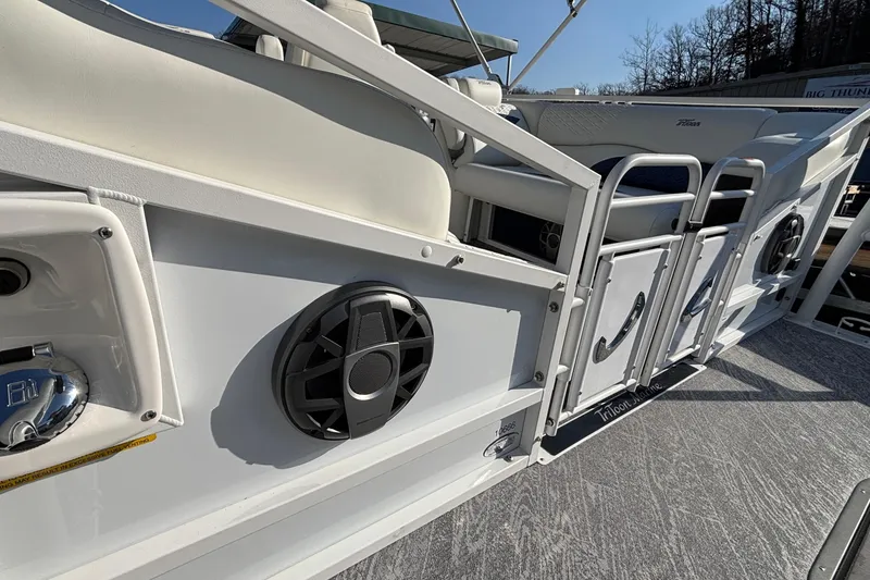 Slide: The Image of 2026 JC Sporttoon 26TT boat deck with speakers and seating, showcasing modern design. - 22
