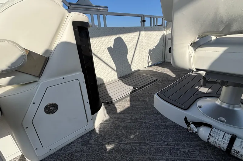 Slide: The Image of Interior of 2026 JC Sporttoon 26TT boat with seating and safety equipment. - 30