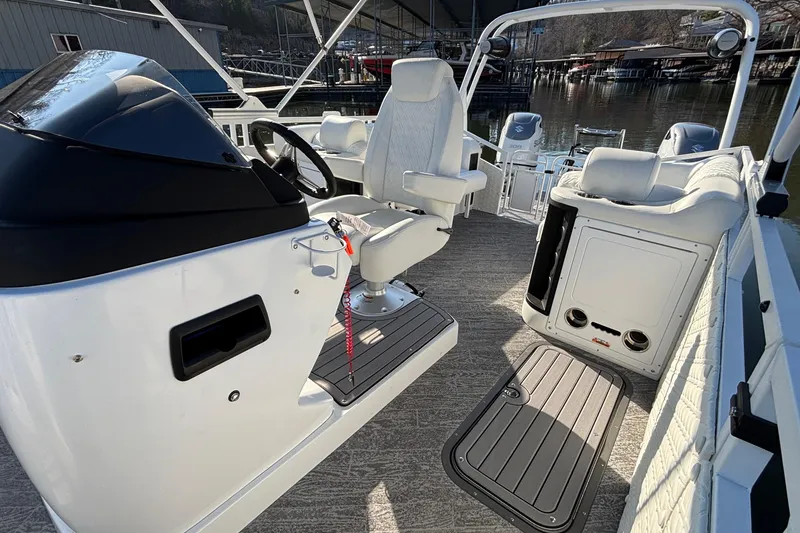 Slide: The Image of Interior of 2026 JC Sporttoon 26TT pontoon boat with modern seating and controls. - 33