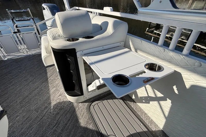 Slide: The Image of Luxury seating and table setup on 2026 JC Sporttoon 26TT pontoon boat. - 36