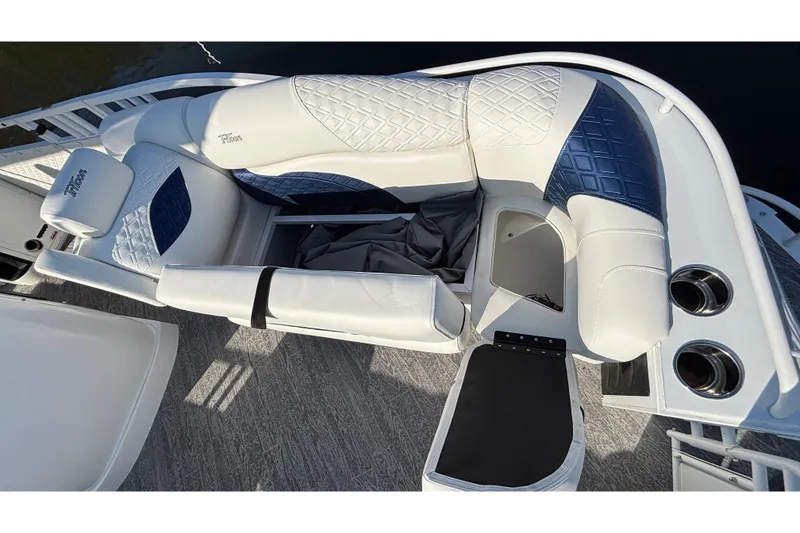 Slide: The Image of Luxurious seating on 2026 JC Sporttoon 26TT boat with quilted upholstery and cup holders. - 55