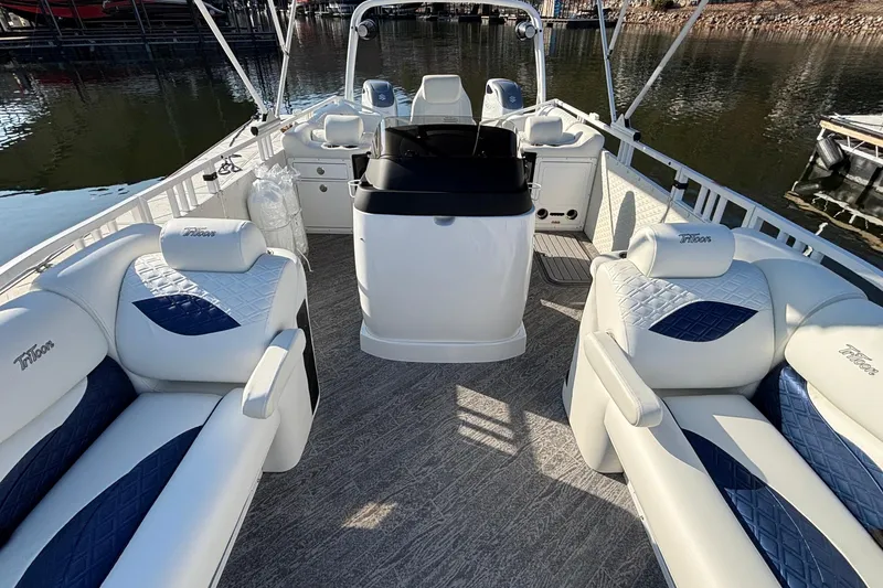 Slide: The Image of Luxurious 2026 JC Sporttoon 26TT pontoon boat interior with plush seating and modern helm. - 57