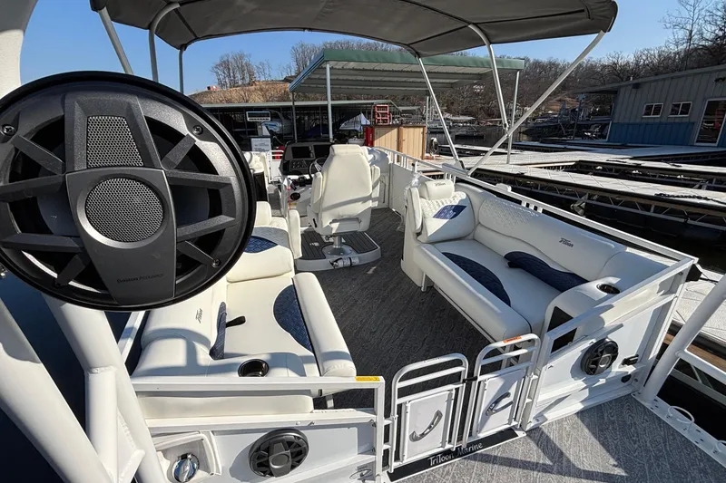 Slide: The Image of 2026 JC Sporttoon 26TT pontoon boat interior with seating and audio system. - 20
