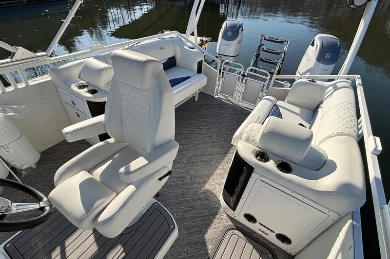 Slide: The Image of Luxurious 2026 JC Sporttoon 26TT pontoon boat interior with plush seating and modern design. - 31