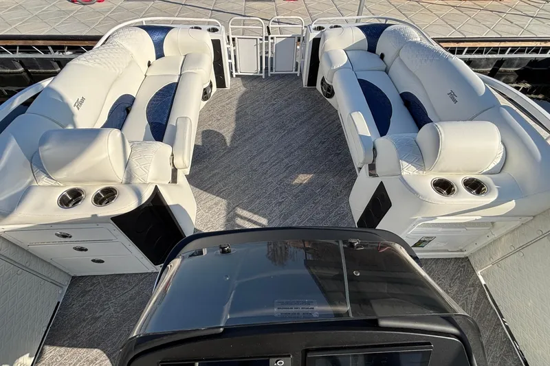 Slide: The Image of Luxurious interior of 2026 JC Sporttoon 26TT pontoon boat with plush seating and cup holders. - 59