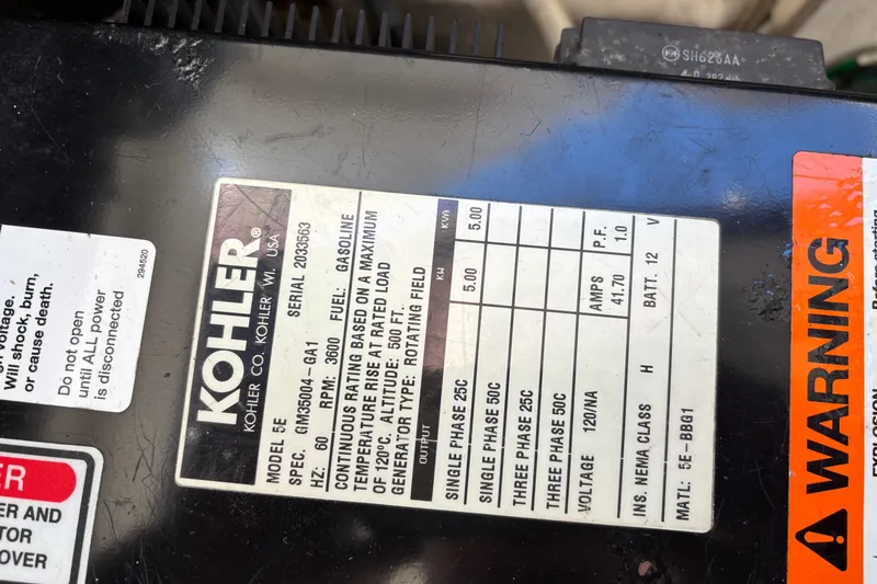 Slide: The Image of Label on Kohler generator, model 5E, with warning sticker, Sea Ray 300 Sundancer 2005. - 18