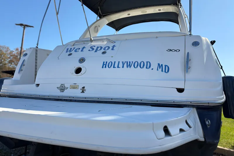 Slide: The Image of 2005 Sea Ray 300 Sundancer boat with "Wet Spot" name, docked in Hollywood, MD. - 2