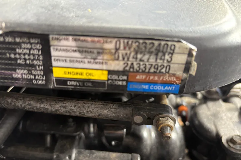 Slide: The Image of Close-up of a 2005 Sea Ray 300 Sundancer engine serial number plate. - 21