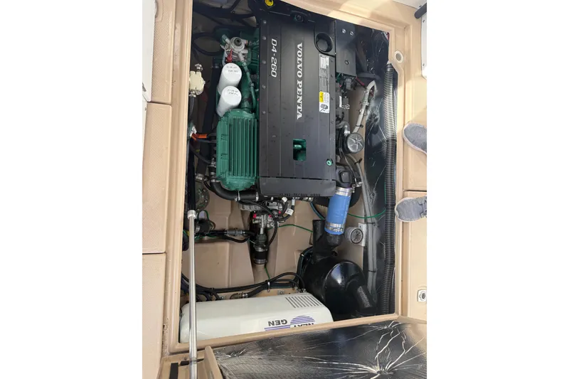 Slide: The Image of Engine compartment of a 2015 Cutwater 28 boat with Volvo Penta D4-260 engine. - 24