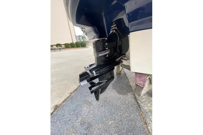 Slide: The Image of 2023 Chaparral 210 SSi boat with MerCruiser outdrive on display. - 12