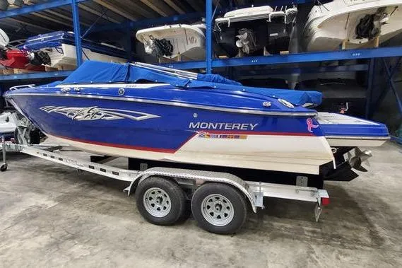 The Image of 2019 Monterey 218SS Super Sport boat on trailer in storage facility. - 0