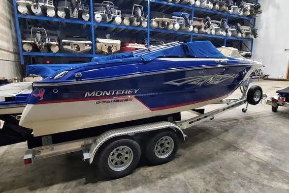 Slide: The Image of 2019 Monterey 218SS Super Sport boat on trailer in storage facility. - 1
