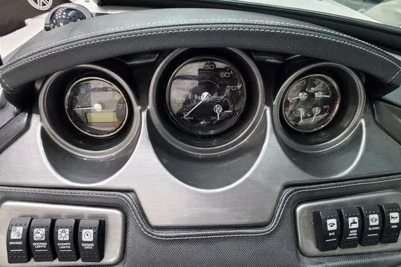 Slide: The Image of Dashboard of a 2019 Monterey 218SS Super Sport boat with gauges and controls. - 10