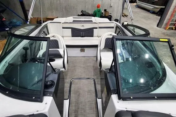 Slide: The Image of 2019 Monterey 218SS Super Sport boat interior with seating and windshield. - 12