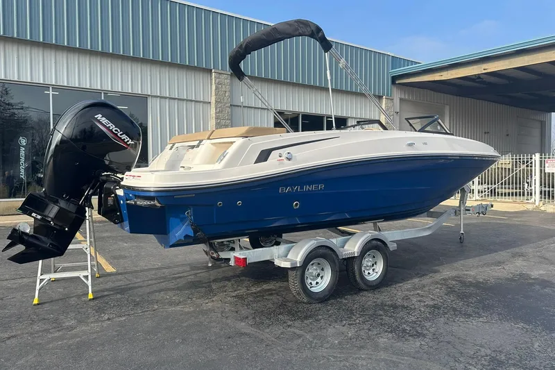 Slide: The Image of 2026 Bayliner VR6 Bowrider OB on trailer, featuring Mercury outboard motor. - 2