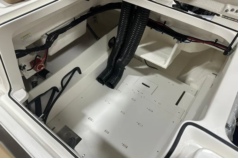 Slide: The Image of 2026 Bayliner VR6 Bowrider OB engine compartment, showcasing wiring and ventilation. - 32