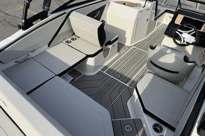 Slide: The Image of 2026 Sea Ray SPX 210 Outboard interior with modern seating and sleek design. - 4