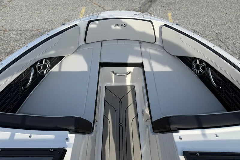 Slide: The Image of 2026 Sea Ray SPX 210 Outboard boat interior with sleek seating and modern design. - 9