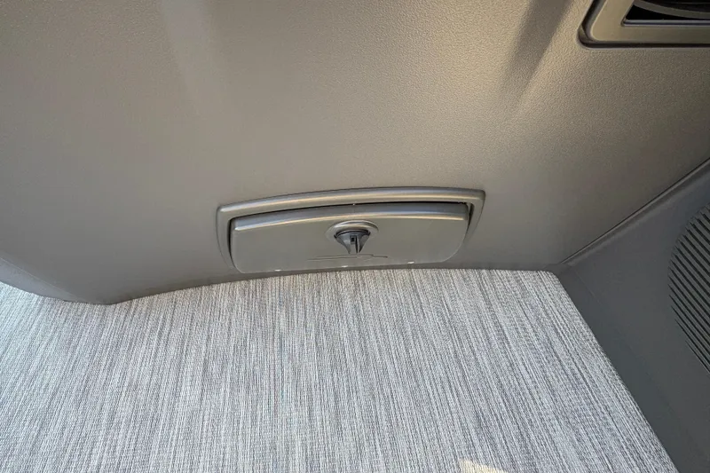 Slide: The Image of Interior detail of 2026 Bennington 22 S-One Swingback boat, featuring a sleek panel design. - 15