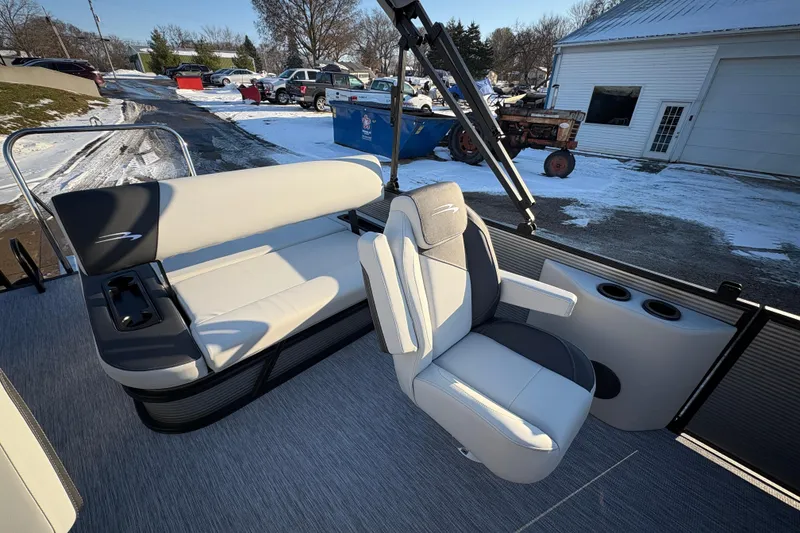 Slide: The Image of 2026 Bennington 22 S-One Swingback boat interior with seating and cup holders. - 16