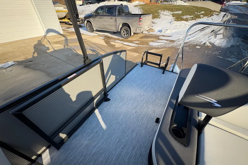 Slide: The Image of 2026 Bennington 22 S-One Swingback boat with sleek deck design and modern seating. - 20