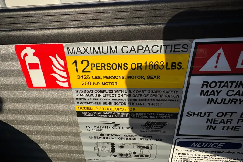 Slide: The Image of Bennington 22 S-One Swingback 2026 capacity label: 12 persons or 1663 lbs, 200 HP motor. - 23