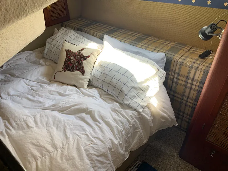Slide: The Image of Cozy bedroom in a 1982 Bayliner 3788 Motoryacht. - 30