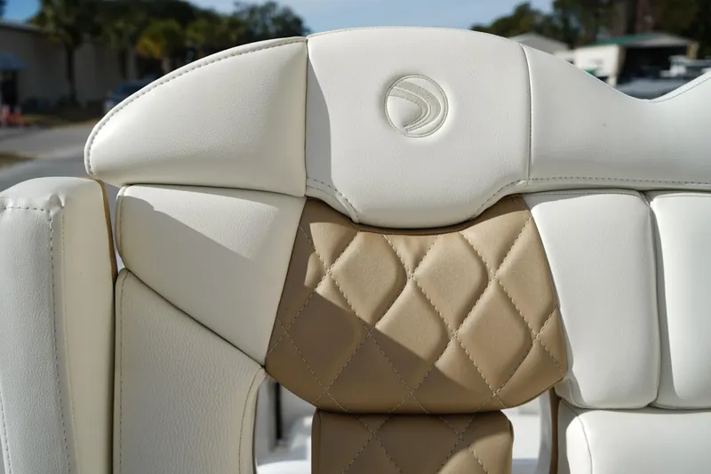 Slide: The Image of Luxurious beige and white leather seating on 2021 Edgewater 230CC boat. - 5
