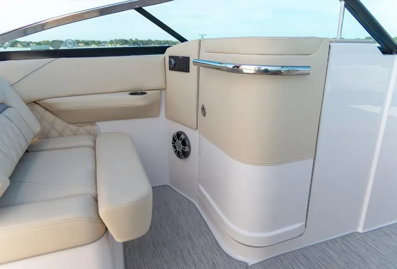 Slide: The Image of Manufacturer Provided Image: 2026 Regal LS6 boat interior with beige seating and modern design. - 11