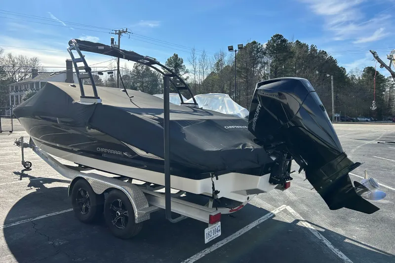 Slide: The Image of 2022 Chaparral 23 SSi OB boat on trailer with cover and outboard motor. - 10