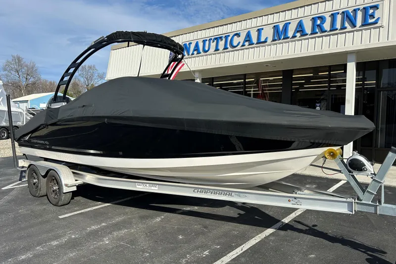 Slide: The Image of 2022 Chaparral 23 SSi OB boat on trailer outside Nautical Marine store. - 7