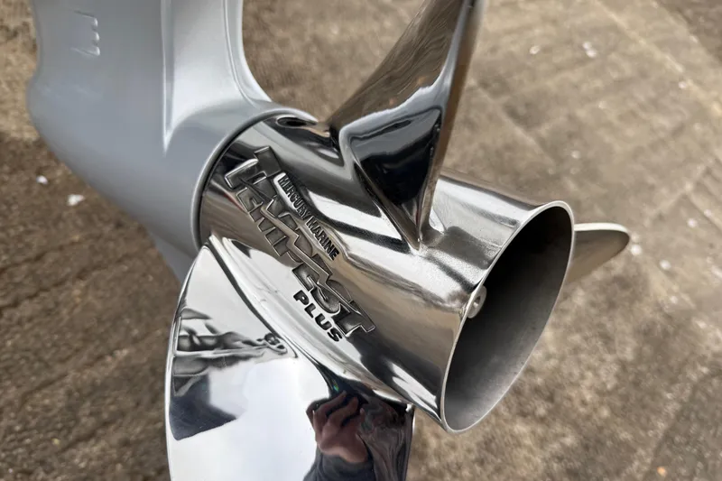 Slide: The Image of 2018 Blazer 625 Pro Elite fishing boat on trailer by a lake. - 10