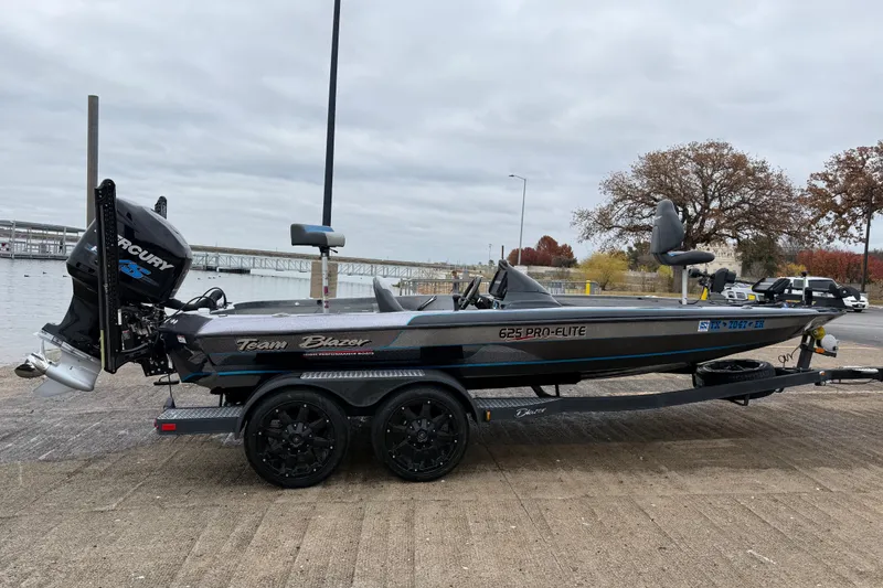 Slide: The Image of Close-up of a shiny propeller on a 2018 Blazer 625 Pro Elite boat. - 16