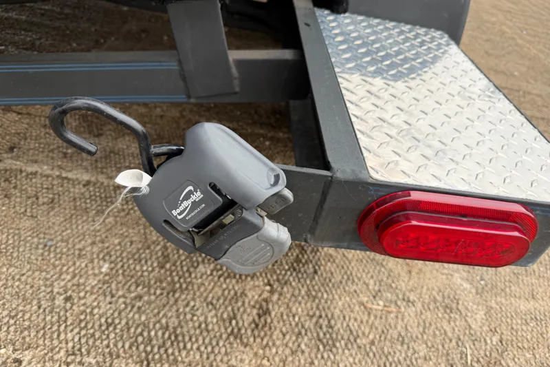 Slide: The Image of 2018 Blazer 625 Pro Elite trailer with BoatBuckle tie-down and red tail light. - 27