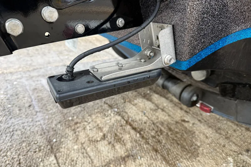 Slide: The Image of Close-up of a 2018 Blazer 625 Pro Elite boat's transducer and mounting bracket. - 28