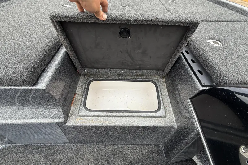 Slide: The Image of 2018 Blazer 625 Pro Elite boat storage compartment with open lid, showcasing interior space. - 39
