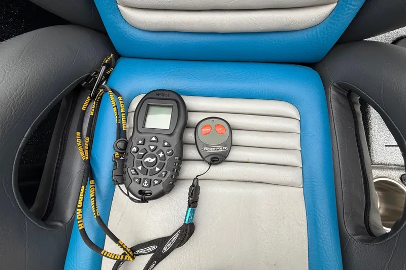 Slide: The Image of 2018 Blazer 625 Pro Elite boat deck with control panels and textured flooring. - 47