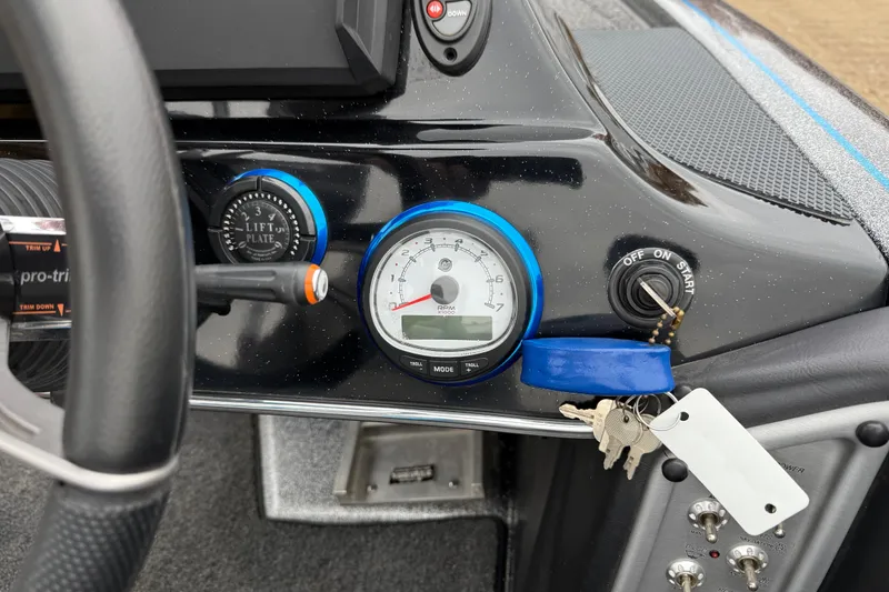 Slide: The Image of 2018 Blazer 625 Pro Elite dashboard with Humminbird display and gauges. - 50