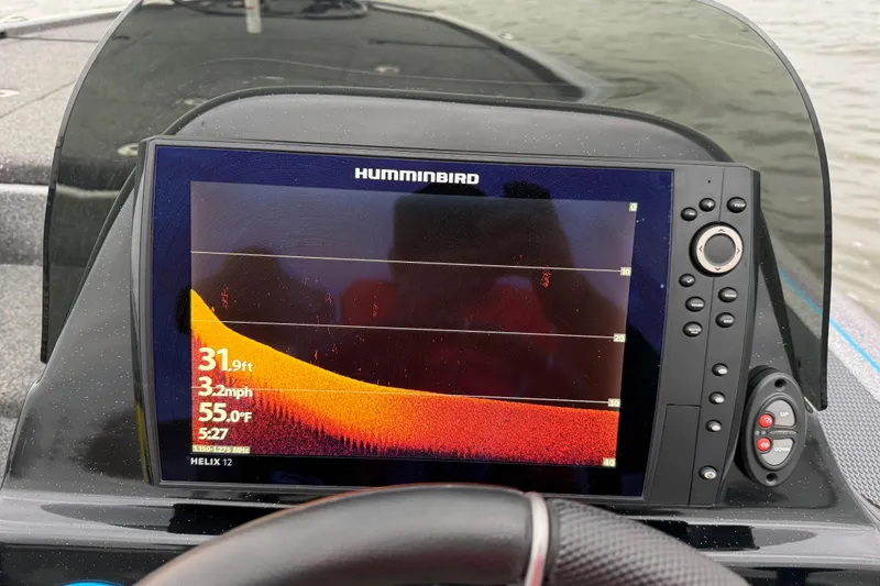 Slide: The Image of Humminbird fish finder on Blazer 625 Pro Elite boat, displaying depth and speed data. - 55