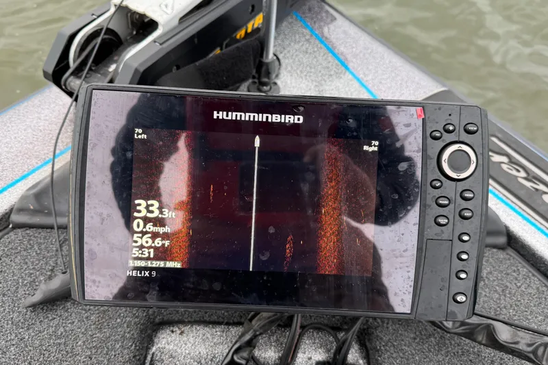 Slide: The Image of Humminbird fish finder on 2018 Blazer 625 Pro Elite boat, displaying sonar data. - 60