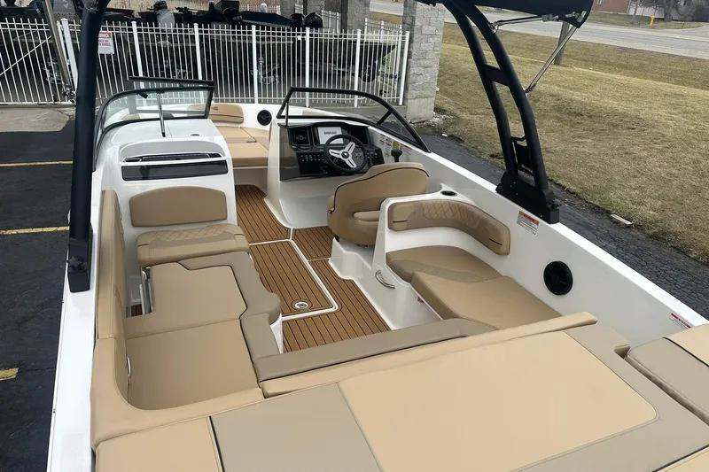 Slide: The Image of 2025 Bayliner VR6 Bowrider OB with spacious seating and modern interior design. - 5