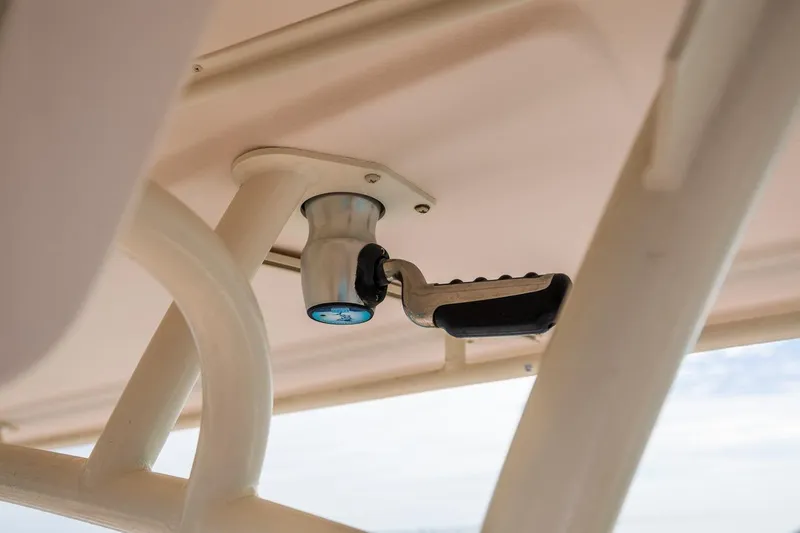 Slide: The Image of 2014 Grady-White Canyon 336 boat detail, featuring a mounted light fixture. - 36