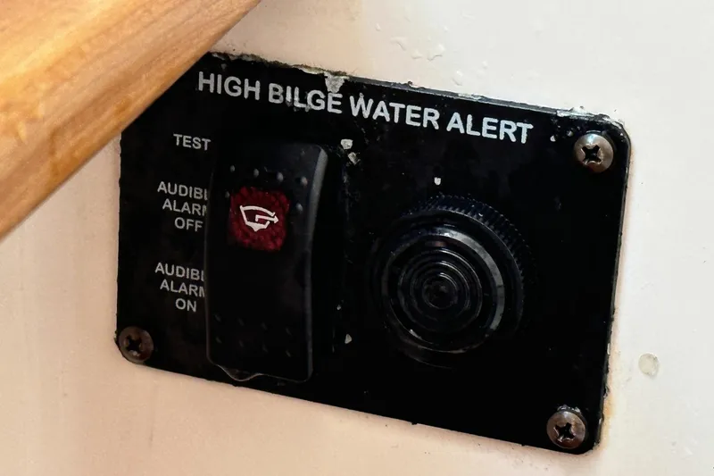 Slide: The Image of High bilge water alert panel on 2014 Grady-White Canyon 336 boat. - 37