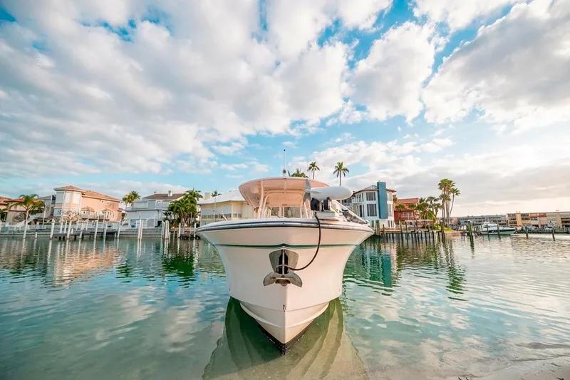 Slide: The Image of 2014 Grady-White Canyon 336 boat docked in scenic waterfront setting. - 40