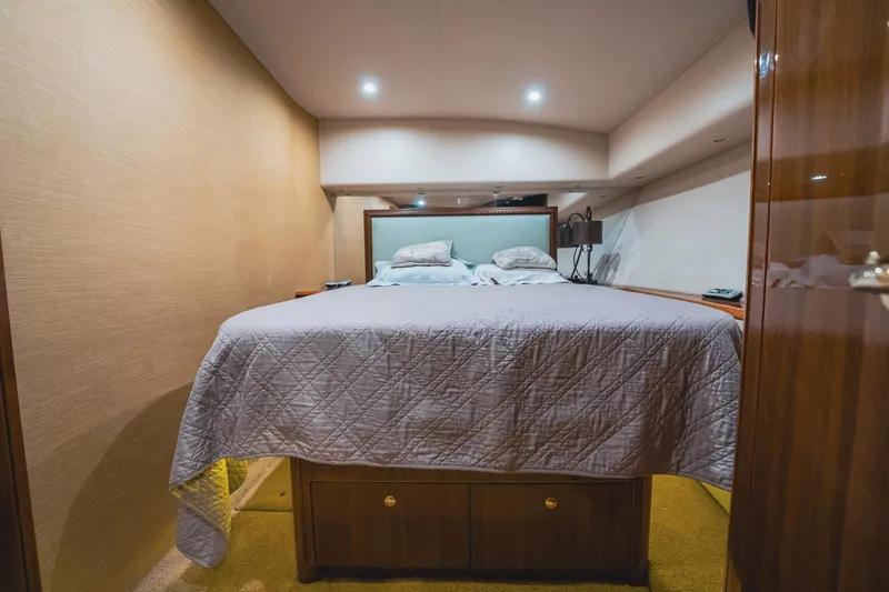 Slide: The Image of Luxurious bedroom in 2005 Viking 48 Convertible yacht with cozy bedding. - 20