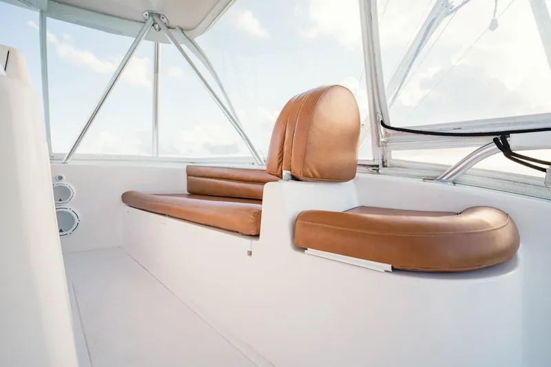 Slide: The Image of 2005 Viking 48 Convertible yacht interior with brown leather seating. - 44