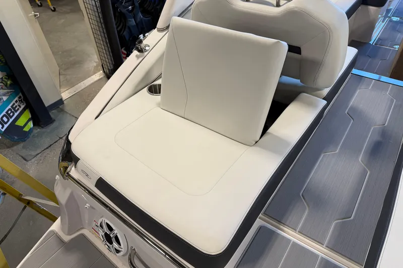 Slide: The Image of 2026 Regal LS6 Surf boat interior with white seating and modern design. - 13